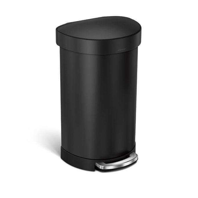 Angled view of Simplehuman 45L Semi-Round Step Can in Matte Black, hands-free pedal and liner rim.