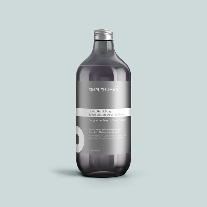 Simplehuman's Fragrance Free Liquid Hand Soap Refill Bottle on a colored background.