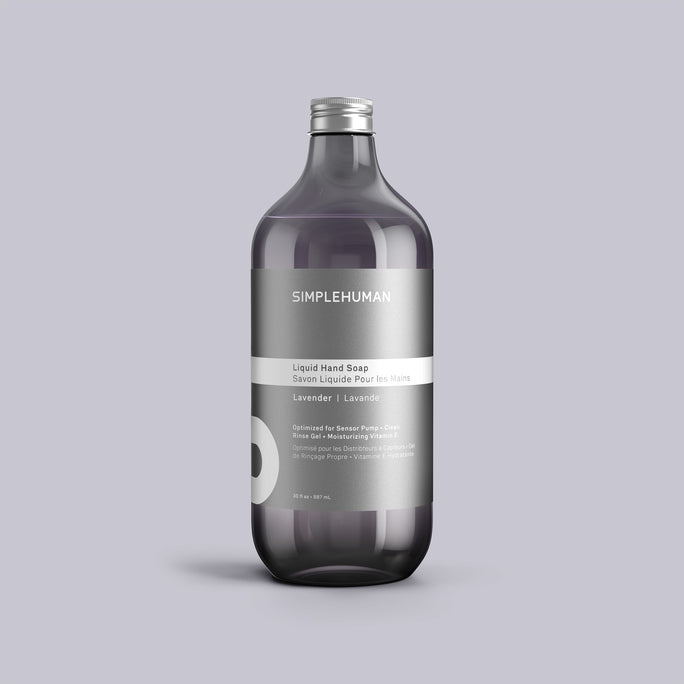 Simplehuman's Lavender Liquid Hand Soap Refill Bottle on a colored background.