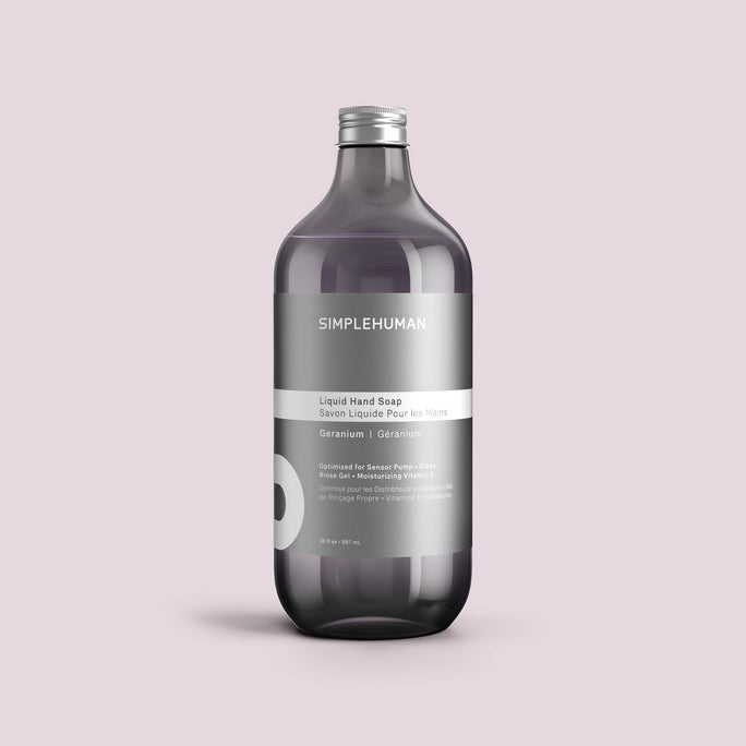 Simplehuman's Geranium Liquid Hand Soap Refill Bottle on a colored background.