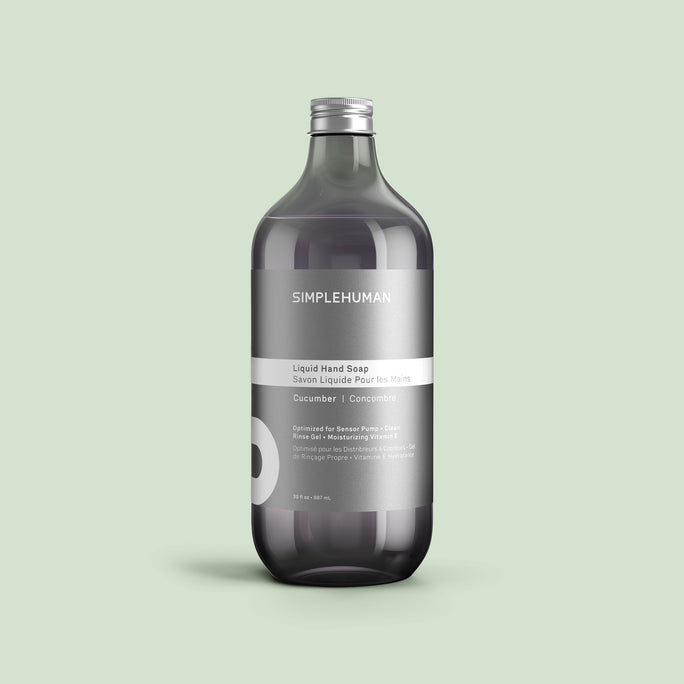 Simplehuman's Cucumber Liquid Hand Soap Refill Bottle on a colored background.
