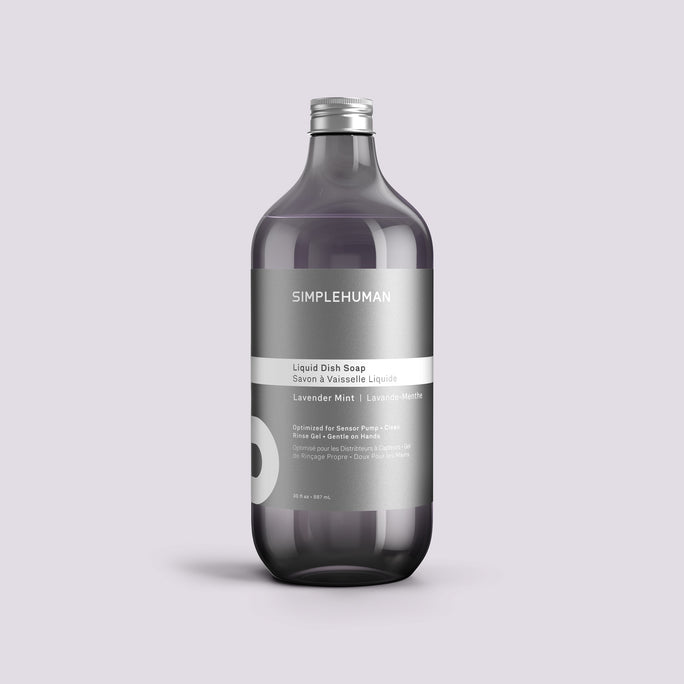 Simplehuman's Lavender Mint Liquid Dish Soap Refill Bottle on a colored background.