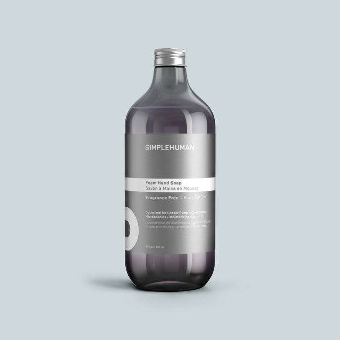 Simplehuman's Fragrance Free Foam Hand Soap Refill Bottle on a colored background.