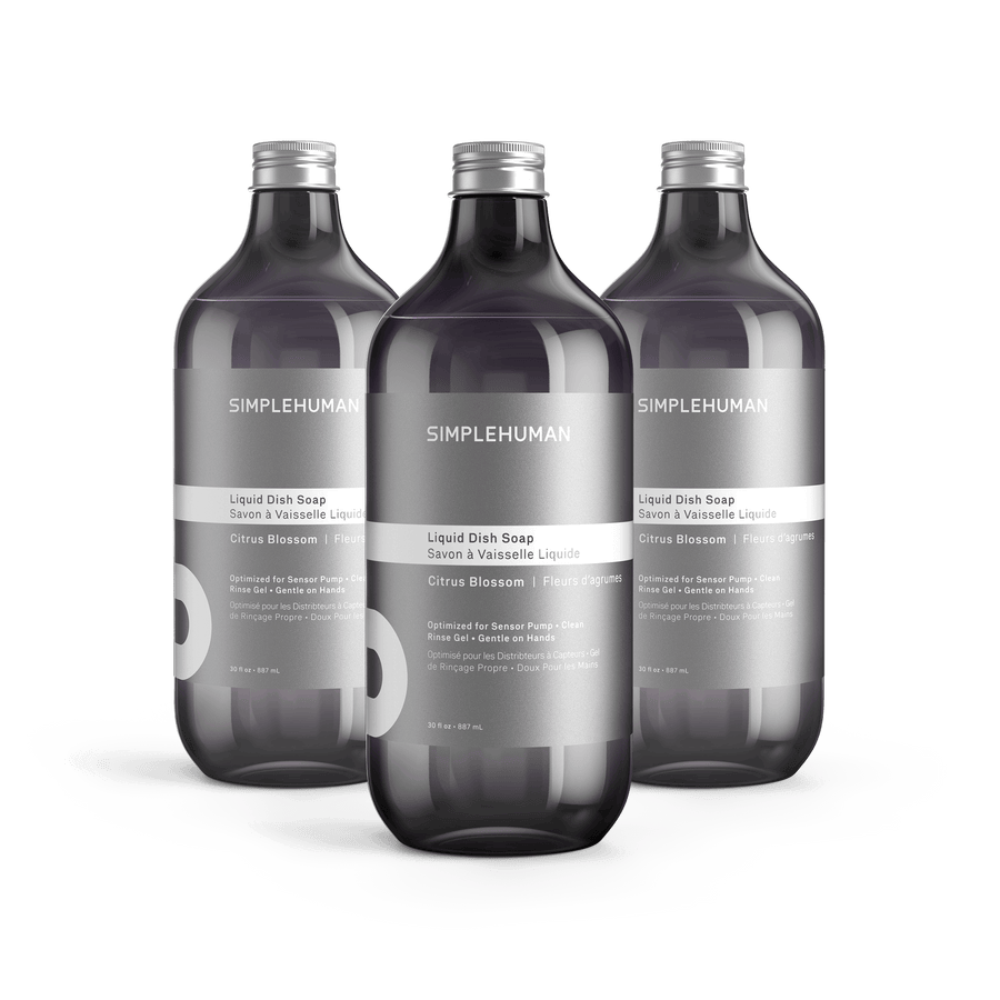 Simplehuman's Citrus Blossom Liquid Dish Soap in 3 charcoal colored bottles and titanium caps.