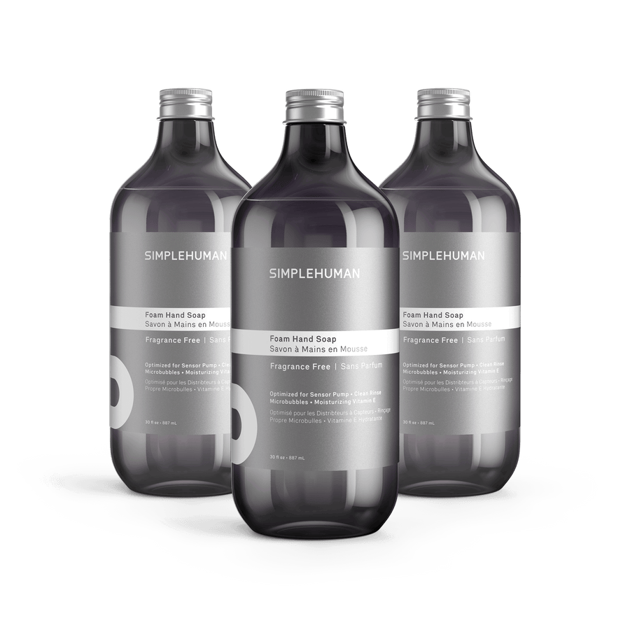 Simplehuman's Fragrance Free Foaming Hand Soap in 3 charcoal colored bottles and titanium caps.