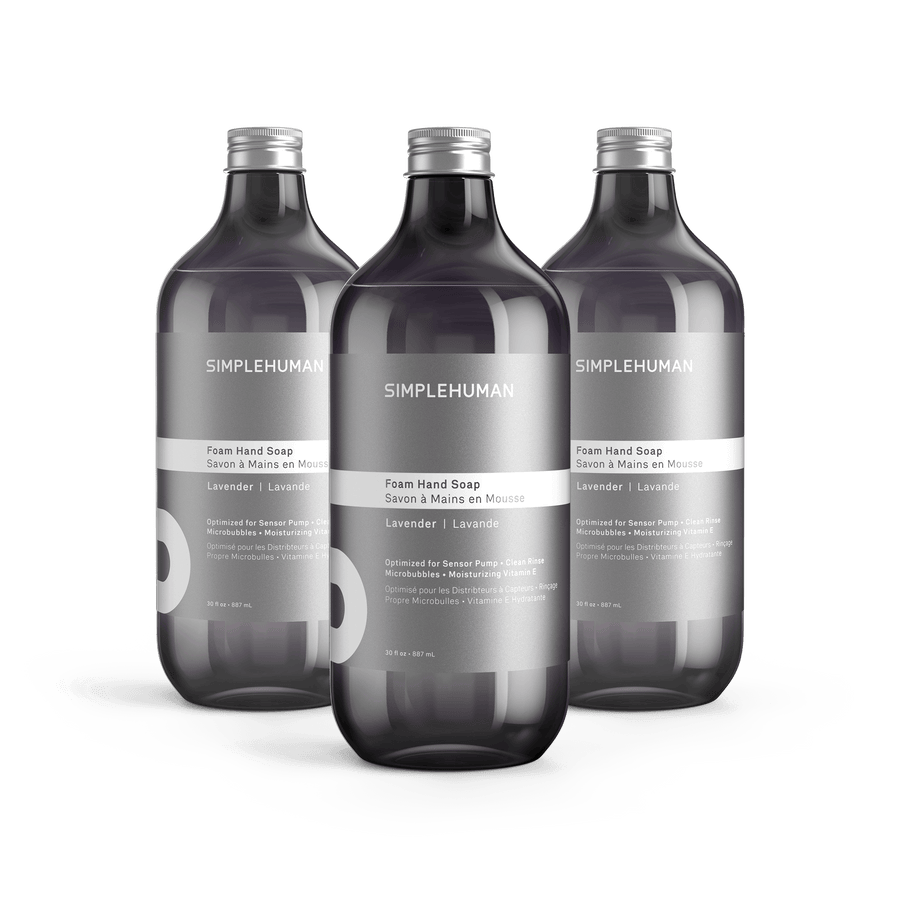 Simplehuman's Lavender Foaming Hand Soap in 3 charcoal colored bottles and titanium caps.
