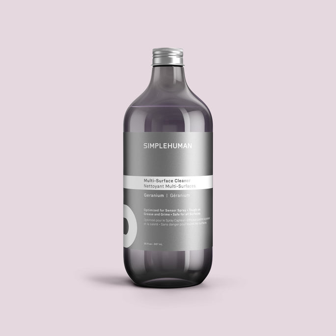 Simplehuman's Geranium Multi-Surface Cleaner Refill Bottle on a colored background.