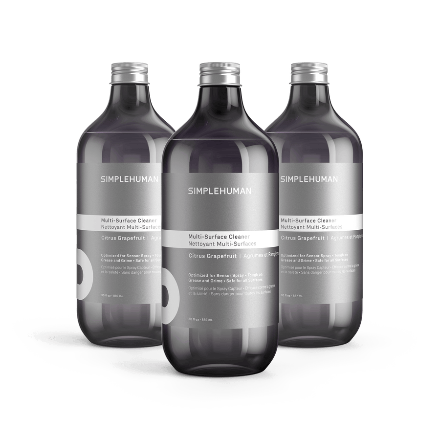 Simplehuman's Citrus Grapefruit Multi-Surface Cleaner in 3 charcoal colored bottles and titanium caps.