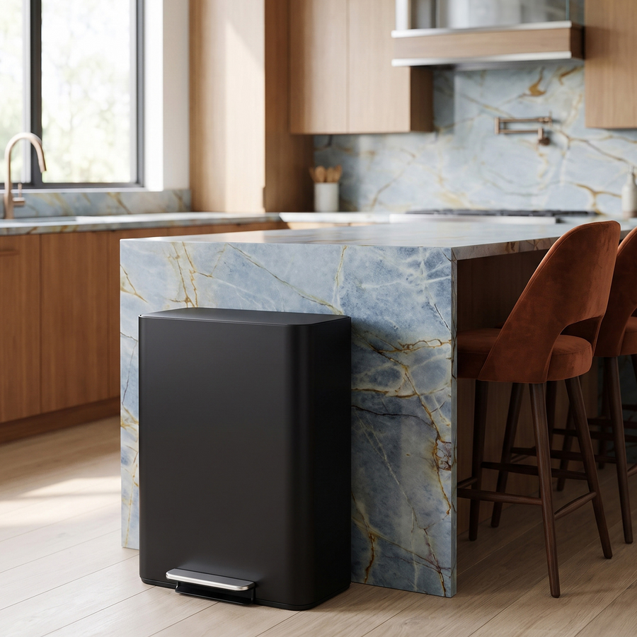 Simplehuman's Matte Black 30L Step Recycler in a modern kitchen setting with blue marble countertops. 