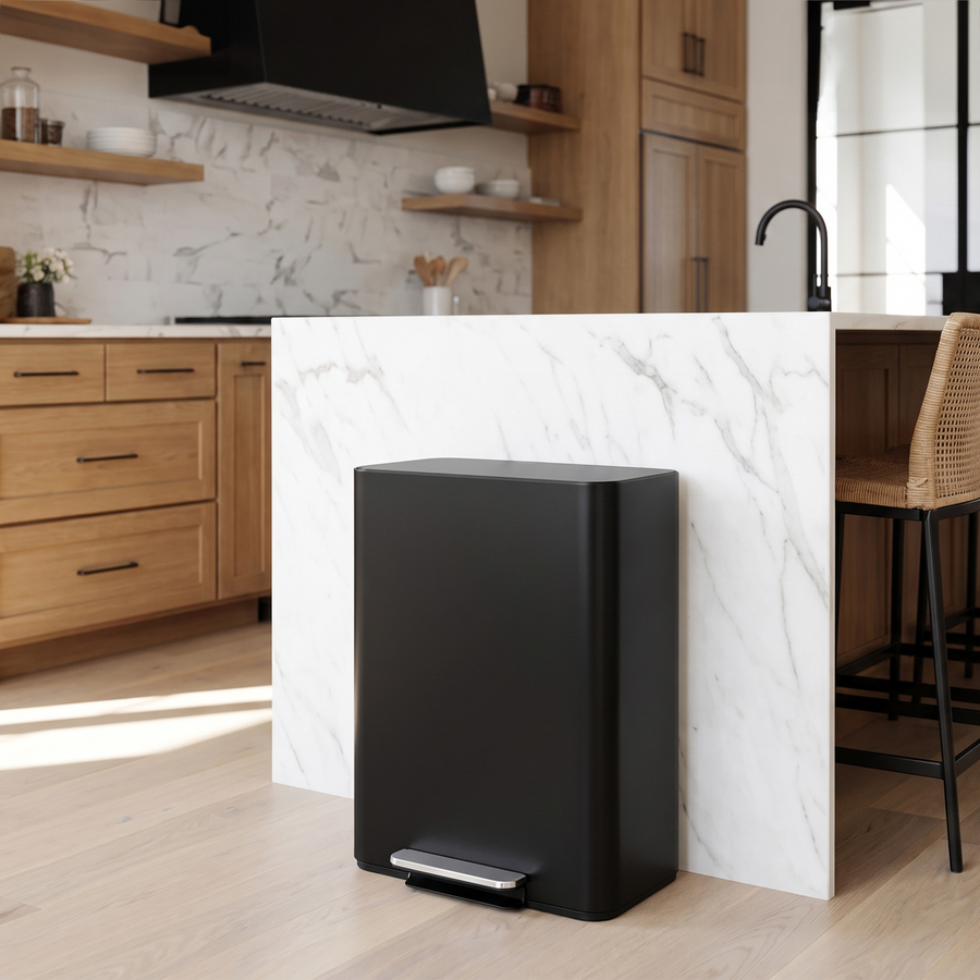 Simplehuman's Matte Black 30L Step Recycler in a modern kitchen setting with marble countertop and wooden cabinets. 