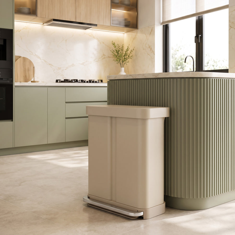 Simplehuman's 58L Step Recycler in a latte finish in a modern kitchen setting. 