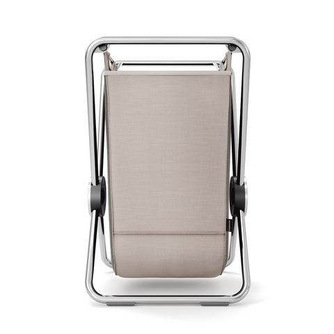 Simplehuman Single X-Frame Hamper in Polished Steel, upright with beige removable liner. Space-saving X-frame design.