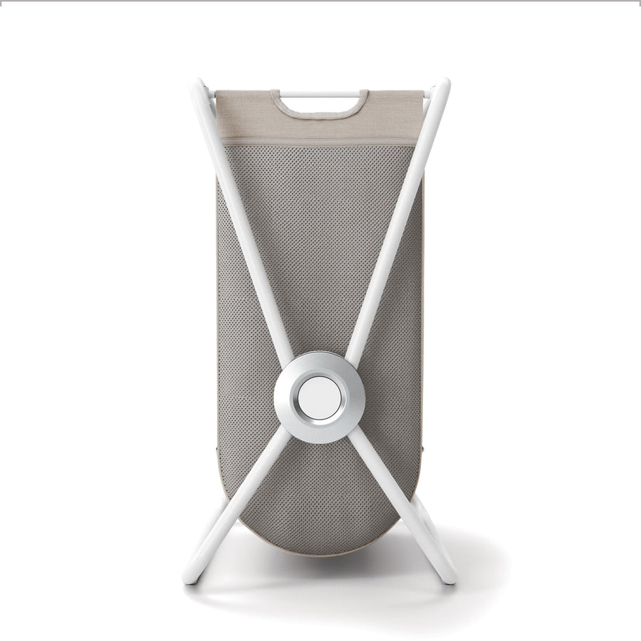 Rear view of Simplehuman Single X-Frame Hamper, White frame, Polished Steel pivot, removable two-tone liner.