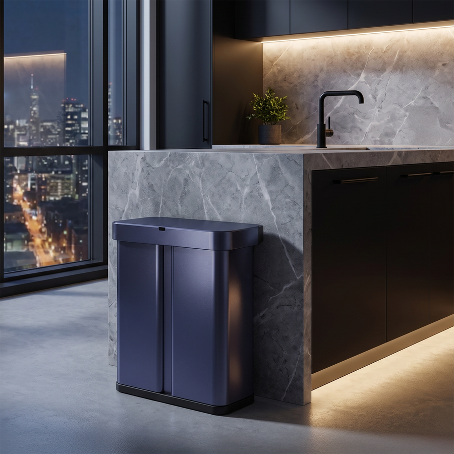 Simplehuman's Nebula Sensor Recycler in a modern kitchen setting resting against a marble countertop. 