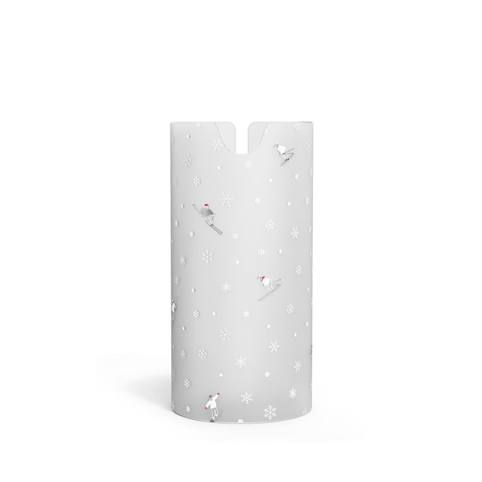 Front view of white, frosted holiday-themed sleeve for Simplehuman 9 oz. Sensor Pump, featuring small skiers and snowflakes.