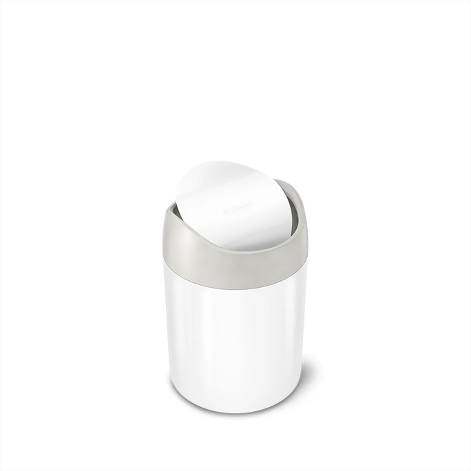 Angled Display of a Simplehuman's Mini Can in white.