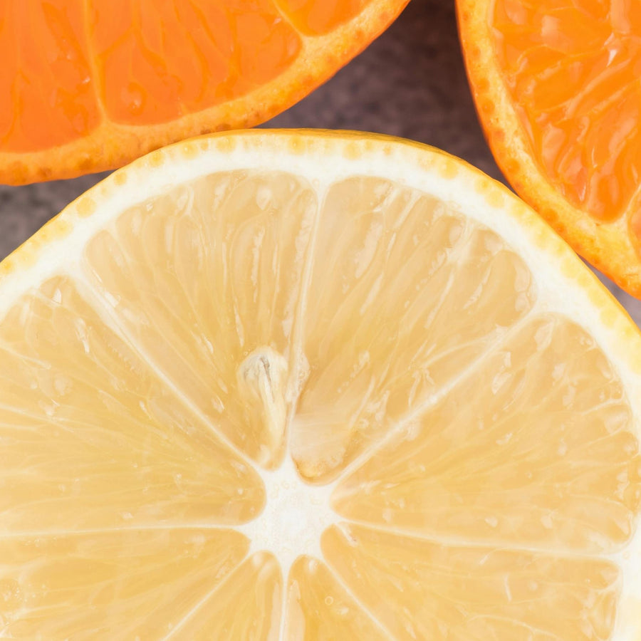 Close up of thinly sliced oranges representing Simplehumans Pomelo scent.