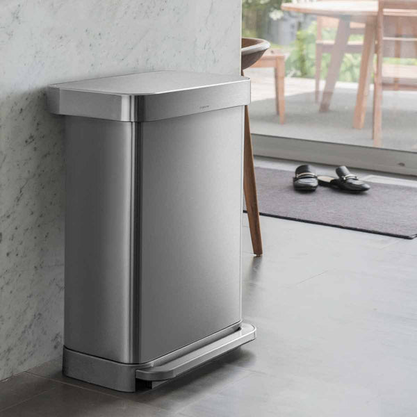 45L rectangular step can with liner pocket - brushed finish - lifestyle up against wall