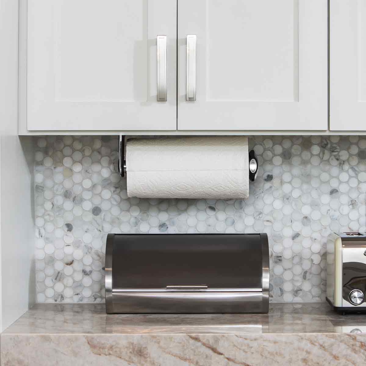 wall mount paper towel holder - lifestyle under kitchen cabinets