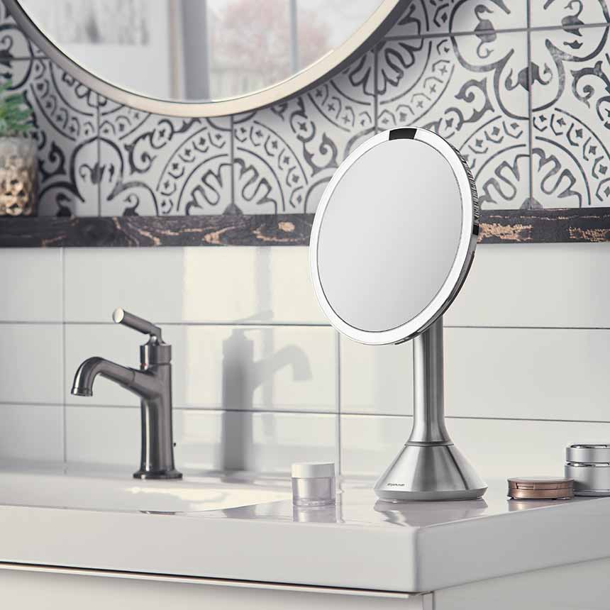 sensor mirror with touch-control brightness