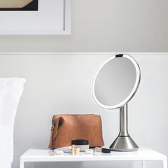 sensor mirror with touch-control brightness