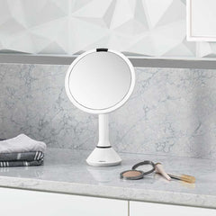 sensor mirror with touch-control brightness